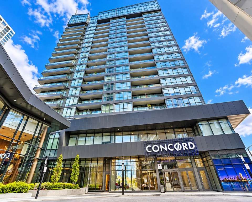 Newton condo tower at 80 Queens Wharf Rd in Toronto's CityPlace on a sunny day
