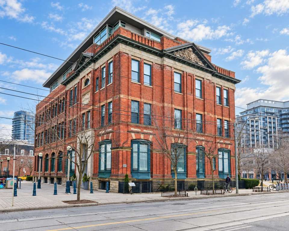 Exterior of Massey Harris Lofts at 915 King St W, Toronto